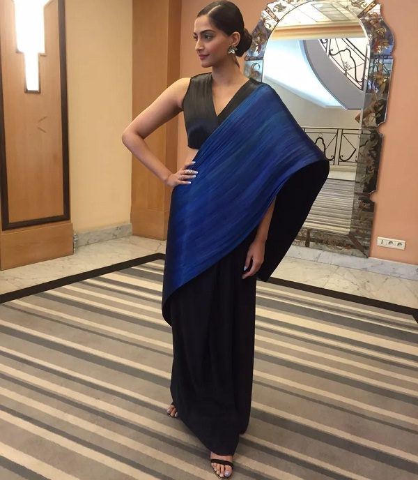 Sonam Kapoor in black and blue saree designed by Rimzim Dadu at Cannes