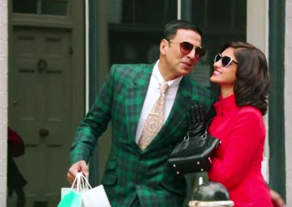 akshay & ileana in plaid suit, akshay & ileana in rustom