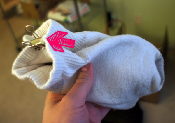 keep socks together using a safety pin
