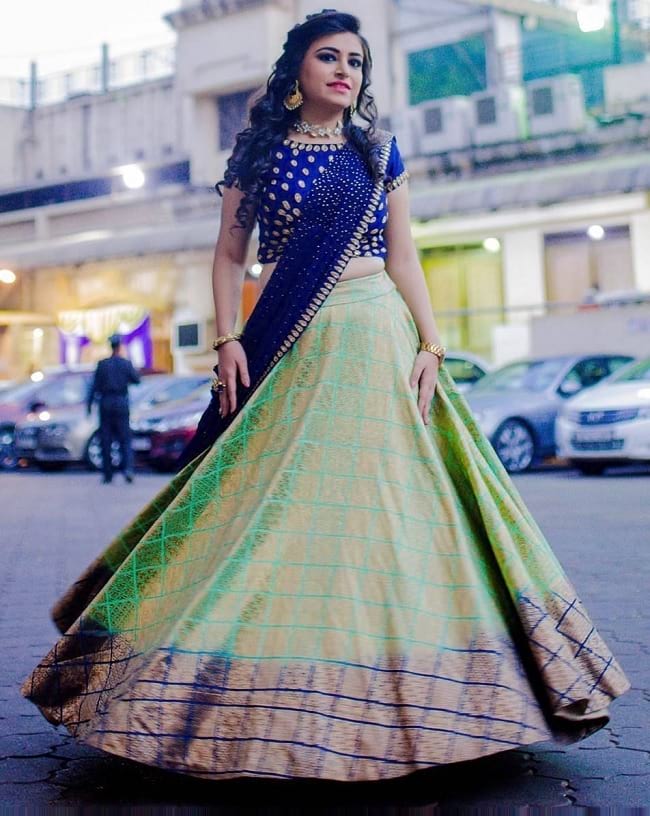 Green Tradition And International Style Lehengas 