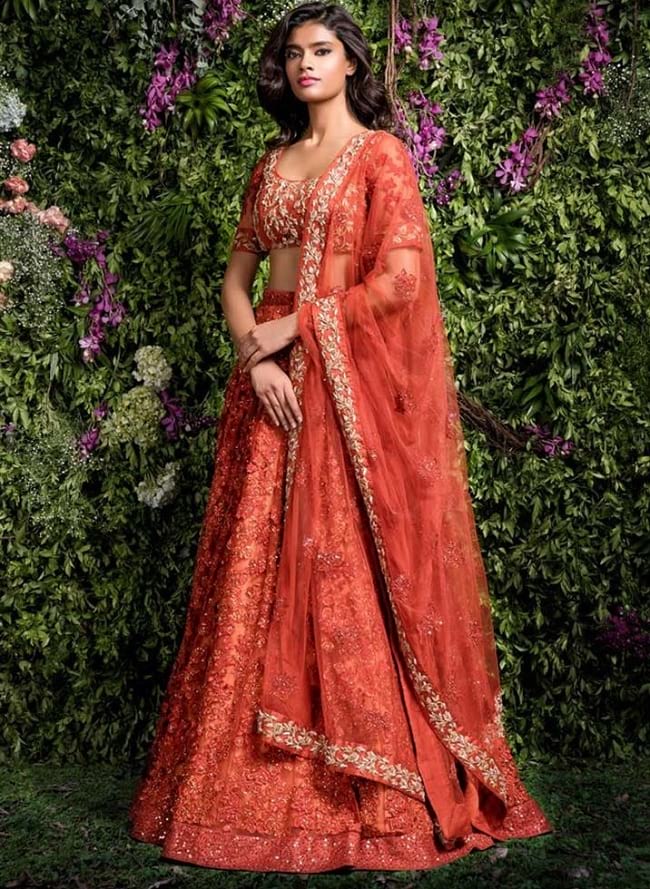 Orange Net & Silk Heavey Embroidered Red Carpet & Bridal Lehengas Choli