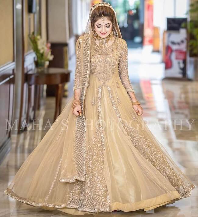 cream stone work bridal lehenga