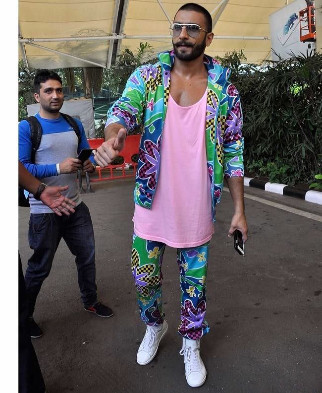 the weird glasses, and the glazy psychedelic print tracksuit
