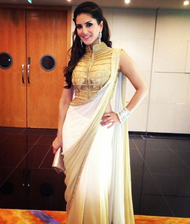 sunny in party wear white and golden saree