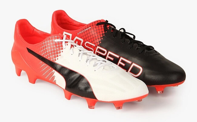 red and black printed football shoes