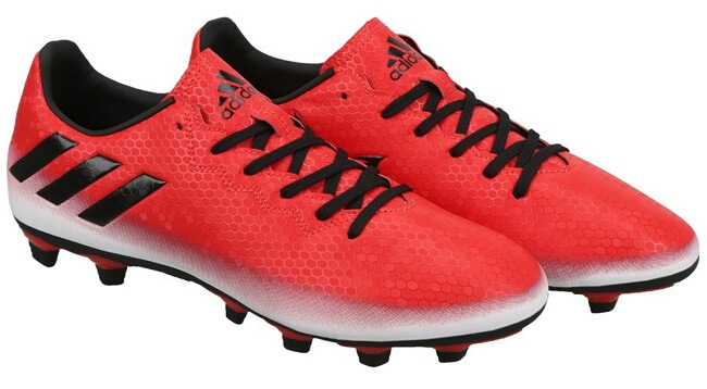 red and black football shoes